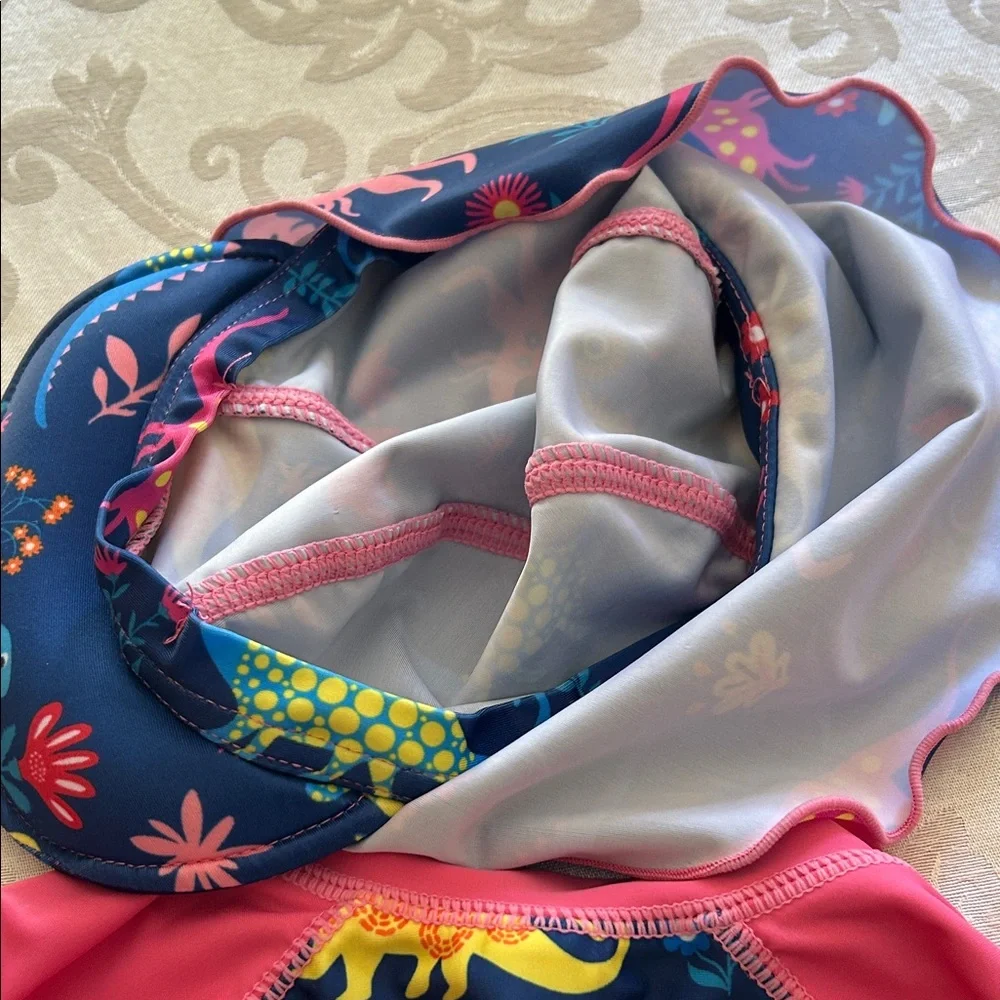 Kids One-Piece Rash Guard Swimsuit in Navy & Pink with Dino Print